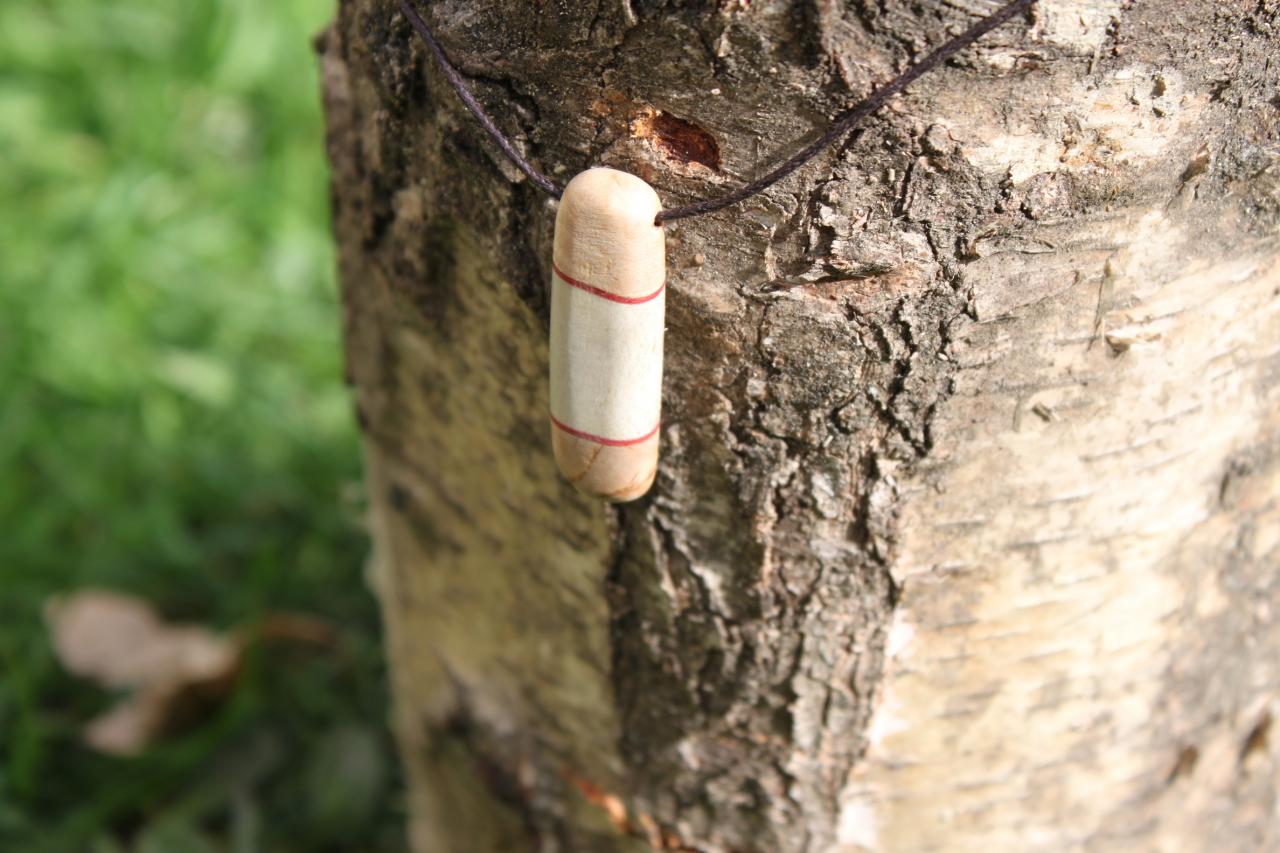 Pendentif en bois de renne et boulot madré