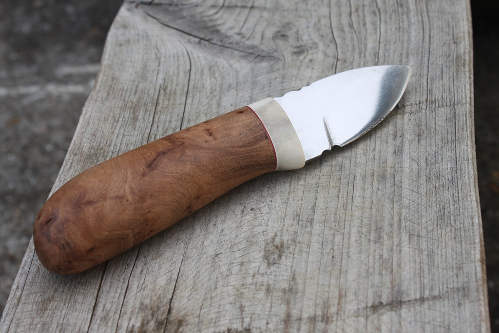 Puukko Orme et renne