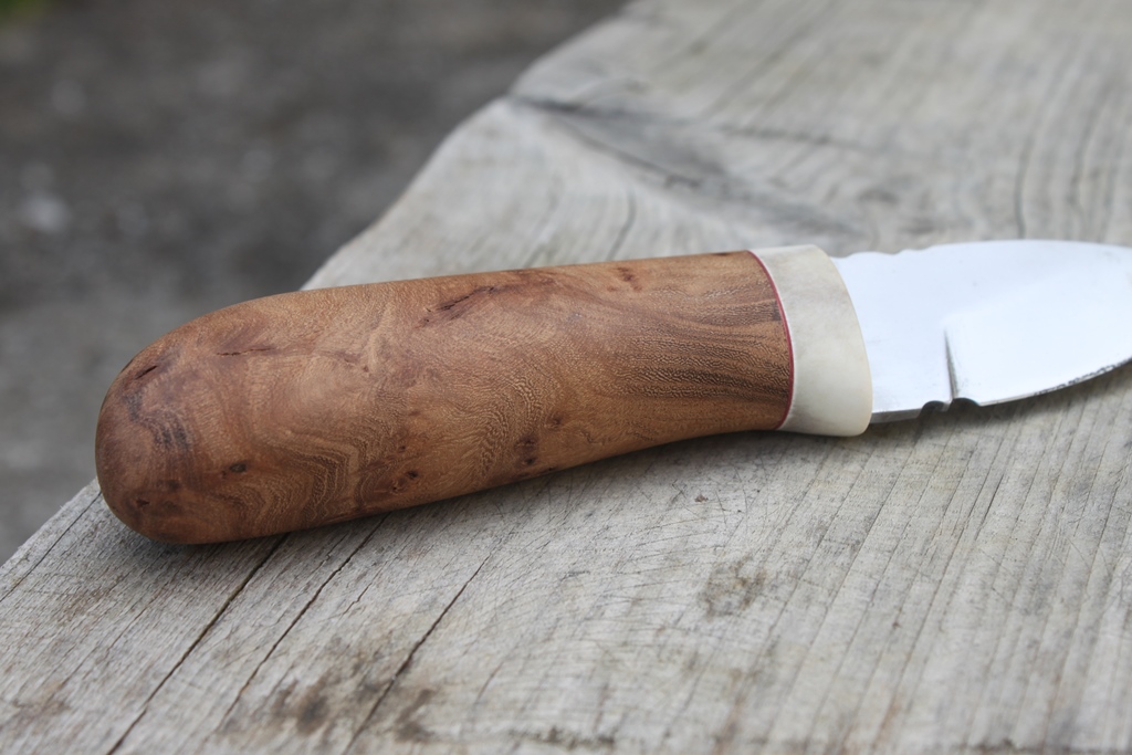 Puukko Orme et renne